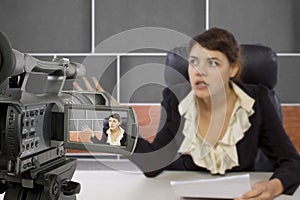 Filming Female Reporter in a Set