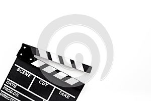 Filmmaker profession. Clapperboard on white background top view copyspace