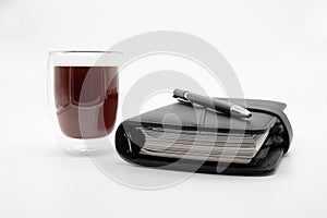 Filofax and coffee,  on white background