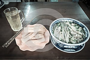 Filtered image Vietnamese breakfast set with Rice Noodle, Youtiao and Iced Tea