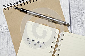 FINACE concept. pen, notebooks and white background photo