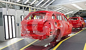 Final inspection of a car body in the paintshop