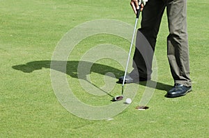 Final putt on golf course