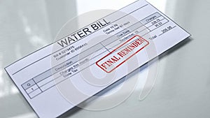 Final reminder seal stamped on water bill, payment for services, month expenses