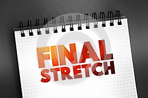 Final Stretch text quote on notepad, concept background