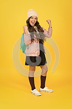 Finally succeed. Modern outfit. Fashion accessory. Girl smiling face little fashionable cutie wear knitted hat and