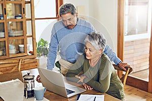 Finance, budget and senior couple on laptop with bills, paperwork and documents for life insurance. Retirement, pension