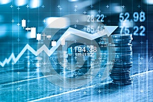 Finance and business concept. Invesment graph and coins rows photo