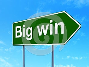 Finance concept: Big Win on road sign background