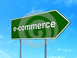 Finance concept: E-commerce on road sign background