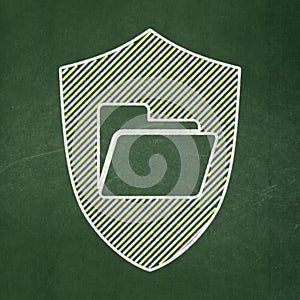 Finance concept: Folder With Shield on chalkboard