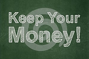 Finance concept: Keep Your Money! on chalkboard background