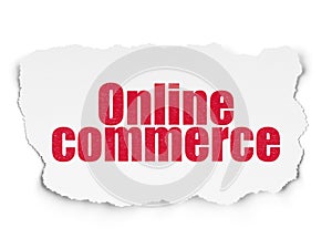 Finance concept: Online Commerce on Torn Paper background