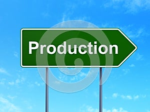 Finance concept: Production on road sign background