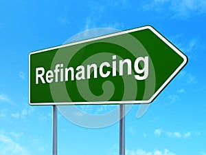 Finance concept: Refinancing on road sign background