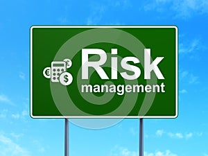 Finance concept: Risk Management and Calculator on