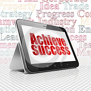 Finance concept: Tablet Computer with Achieve Success on display