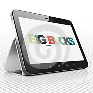 Finance concept: Tablet Computer with Big bucks on display