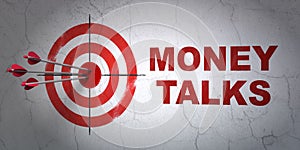 Finance concept: target and Money Talks on wall background