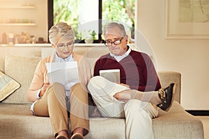 Finance, insurance and accounting with an old couple in their home for retirement or pension planning. Budget, money or