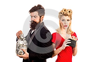 Finance, money and family concept - couple holding dollar cash money. Portrait of rich serious woman and man with money