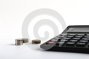 Financial accounting, money calculator on table. Business, finance, saving money, taxes, accounting or investment concept. Coin