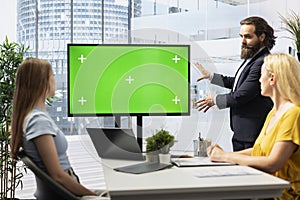 Financial adviser doing presentation on large mockup display photo