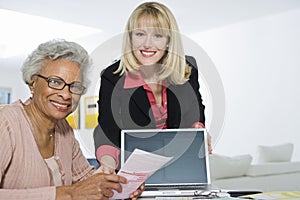 Financial Advisor Assisting Senior Woman photo