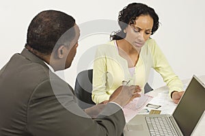 Financial Advisor In Discussion With Woman