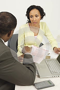 Financial Advisor In Discussion With Woman