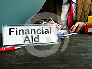 Financial aid phrase on the plate in the office