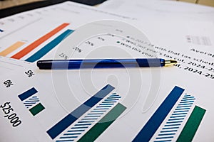 financial and business color charts and graphs on the table