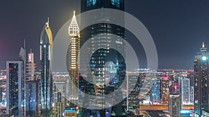 Financial center of Dubai city with luxury skyscrapers all night timelapse, Dubai, United Arab Emirates