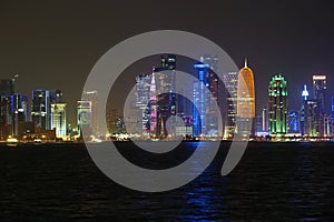 Financial centre in Doha city at night, Qatar