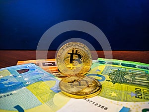 Financial choices represented in golden bitcoins and paper money as cryptocurrency domination in global trade in the future