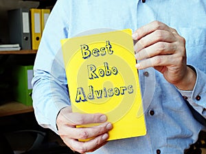 Financial concept about Best Robo-Advisors with inscription on the piece of paper photo