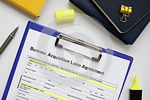 Financial concept about Business Acquisition Loan Agreement with phrase on the business paper