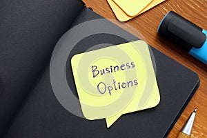 Financial concept about Business Options with sign on the page