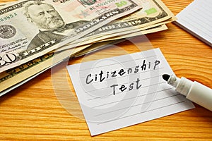 Financial concept about Citizenship Test with phrase on the sheet