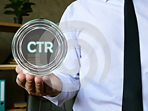 Financial concept about Click-Through Rate CTR with phrase on the piece of paper