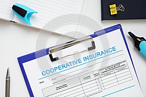 Financial concept about COOPERATIVE INSURANCE with sign on the financial document