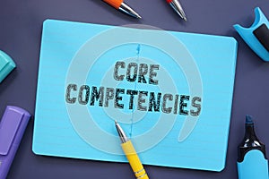 Financial concept about Core Competencies with inscription on the piece of paper