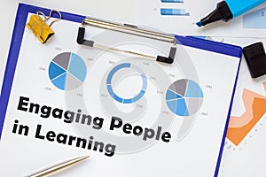 Financial concept about Engaging People in Learning with phrase on the page