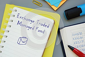 Financial concept about Exchange Traded Managed Fund ETMF with inscription on the piece of paper