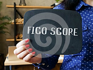 Financial concept about FICO SCORE with sign on the piece of paper