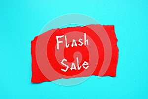 Financial concept about Flash Sale with inscription on the piece of paper