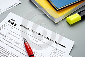 Financial concept about Form 1040-X Amended U.S. Individual Income Tax Return with phrase on the piece of paper