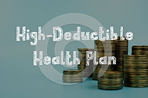 Financial concept about High-Deductible Health Plan HDHP with sign on the page