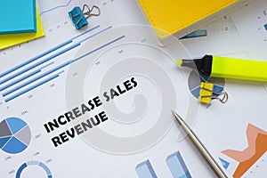 Financial concept about Increase Sales Revenue with inscription on the sheet