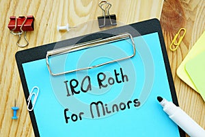 Financial concept about IRA Roth For Minors with sign on the piece of paper